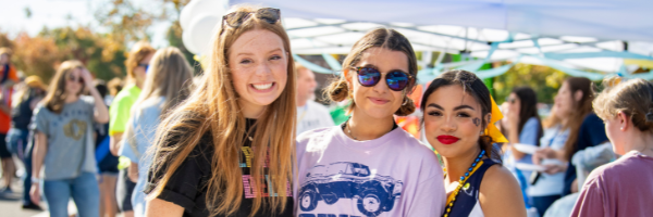 Three girls at tailgate