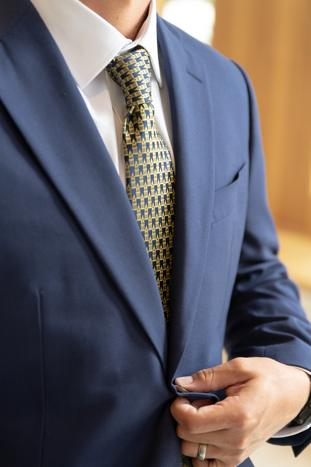 Photo of man wearing UCO-branded necktie