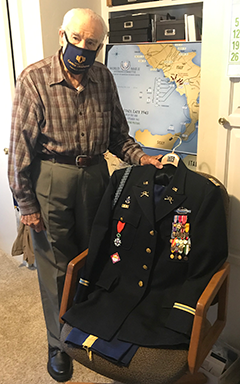 Lt. Col. Oren Peters displaying some of his military regalia.